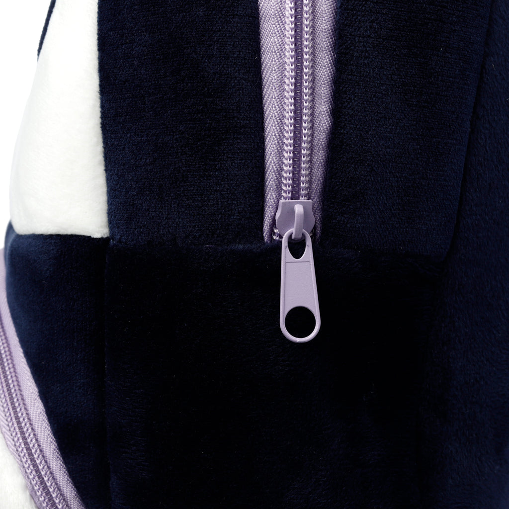 Close-up of the lilac zip and soft plush fabric.