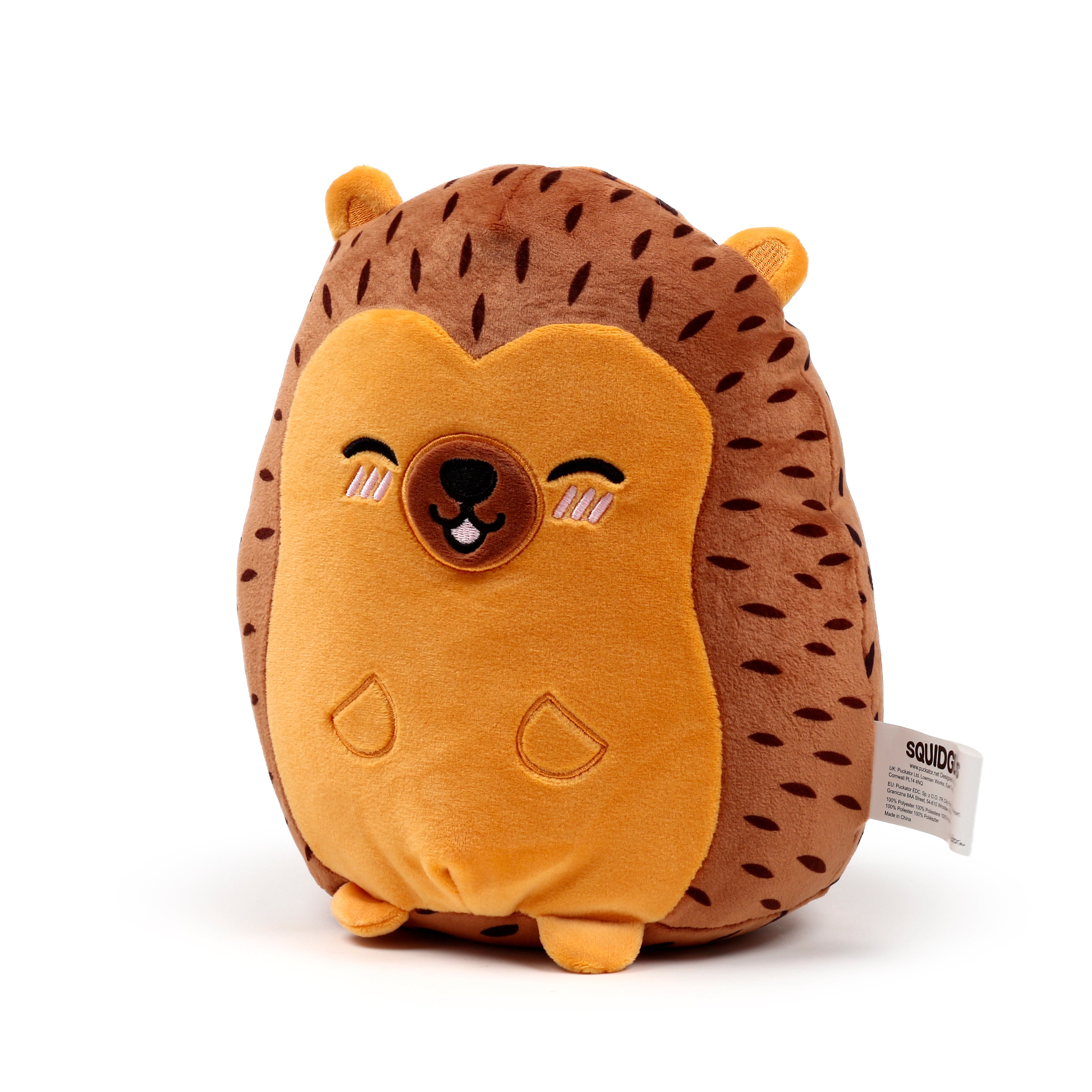 Squidglys Mitzi the Hedgehog plush toy in soft brown Velboa with a winking face  right.