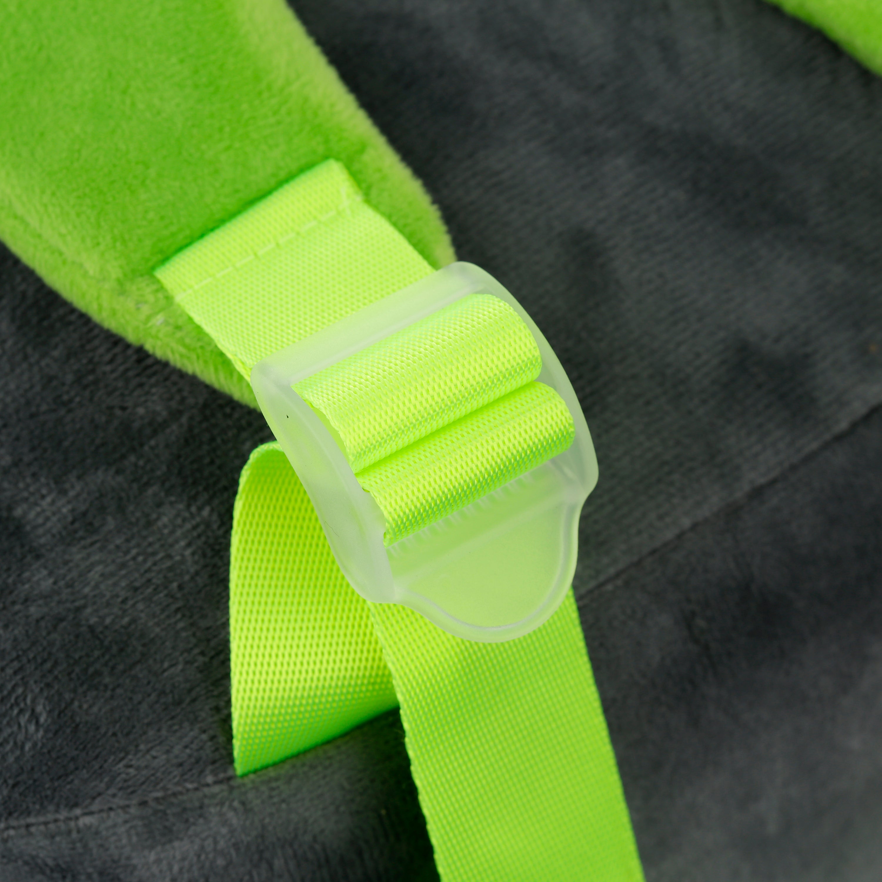 Close-up of the bright lime green strap detail on koala bag.