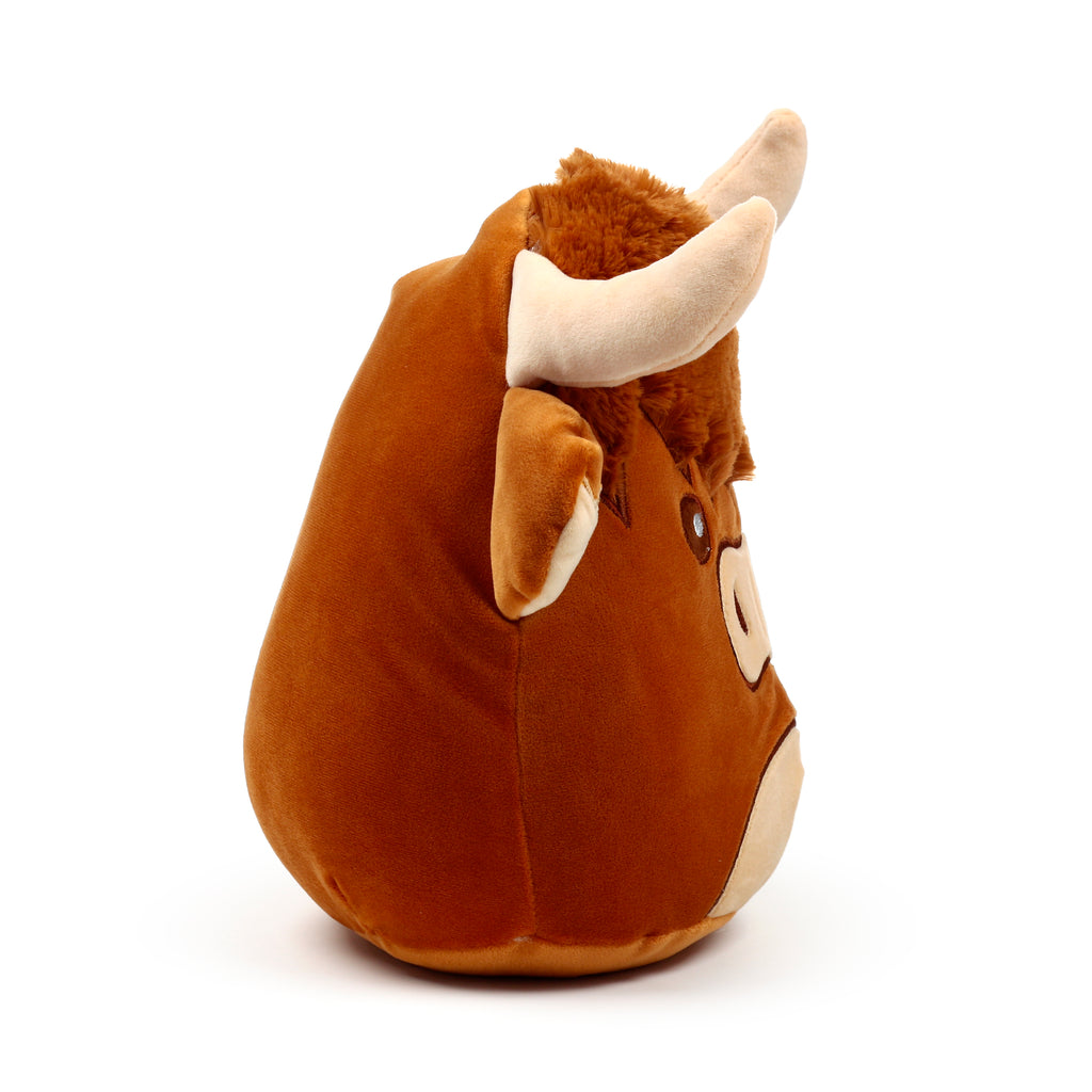Squidglys Highland Coo Cow plush toy with shaggy ginger fur and soft tan horns  profile left.